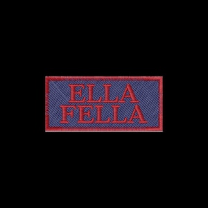 May include: A rectangular embroidered patch featuring a dark blue background with a diagonal twill texture. The text ELLA FELLA is stitched in bold red capital letters across the center, enclosed by a thin red border around the entire edge.