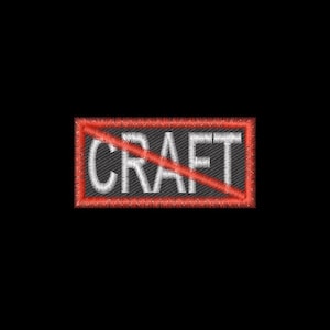May include: A rectangular embroidered patch featuring a black background with the white text CRAFT centered in the middle. A bright red diagonal line crosses through the text from the top left to the bottom right, and the entire patch is bordered in red.