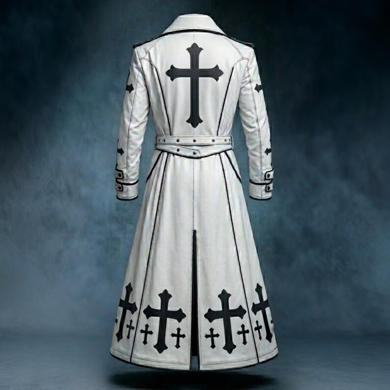 White gothic long trench coat featuring black cross embellishments, tailored silhouette, full-length design, alternative fashion outerwear, front and back view displayed on dark background.