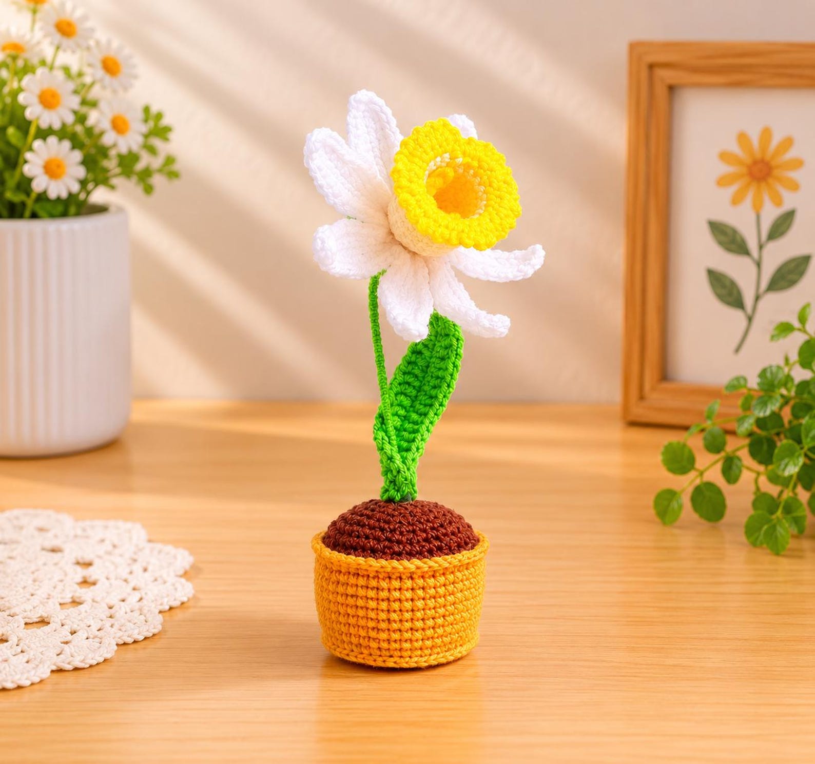 Close-up of crochet narcissus flower petals and trumpet-shaped center showing detailed stitch texture