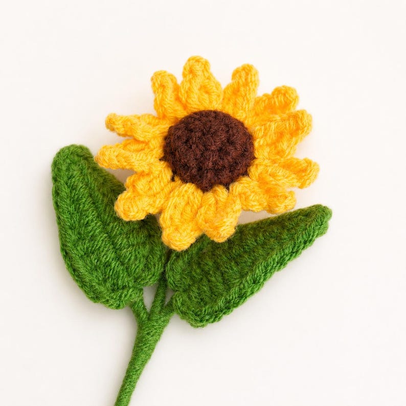 Crochet sunflower bouquet displayed in a vase as a finished home decor arrangement