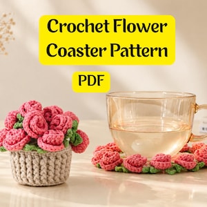 May include: A crochet flower coaster pattern with a PDF download. The image shows a clear glass cup on a crochet coaster with pink roses and green leaves. A small crochet basket with pink roses is also visible. The text on the image says "Crochet Flower Coaster Pattern".