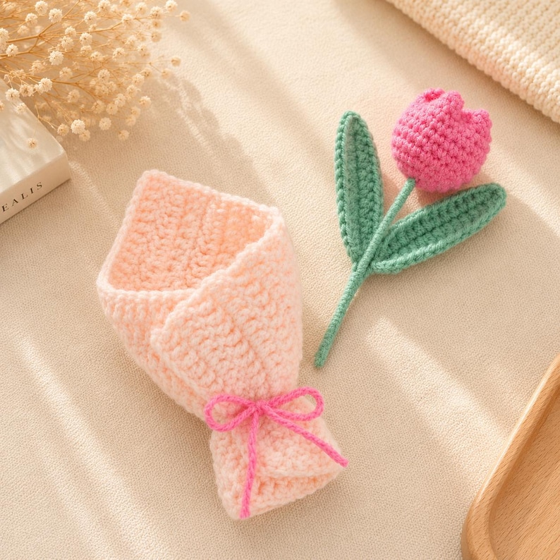 Crochet tulip bouquet wrapped in paper and tied with ribbon, styled as a gift presentation