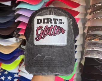 La suciedad es mi gorra de béisbol brillante