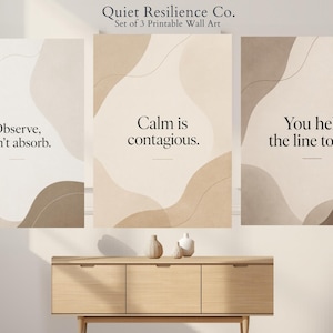 May include: Set of three printable wall art pieces with abstract beige and brown shapes and inspirational quotes. The text includes "Observe, don't absorb," "Calm is contagious," and "You held the line today."