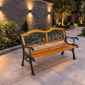 May include: A garden bench featuring a natural wood seat and backrest slats, supported by a black metal frame with ornate, scrollwork detailing on the armrests and the backrest panels. The bench has a curved top edge and four sturdy legs.