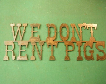 Rusty Metal "We Don't Rent Pigs" Sign - Western Ranch Decor
