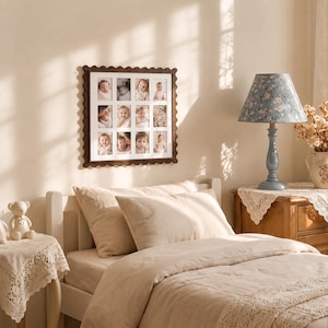 May include: A square dark brown wooden picture frame with a scalloped edge, featuring a white mat with twelve rectangular openings. Each opening displays a black and white photograph of a baby, arranged in a grid of three columns and four rows.
