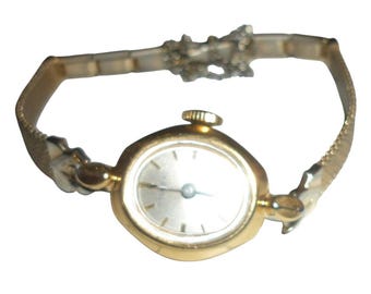 VVintage Timex Mexico Damski owalny zegarek koktajlowy w kolorze złotym z siateczką