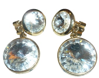 Pendientes colgantes redondos con clip de cristal transparente en tono dorado vintage de Norma Jean