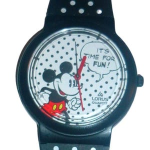 Vintage Lorus Mickey Mouse Watch Polka Dot Band Time For Fun V501-6610 Disney Vintage Lorus Mickey Mouse watch with flags on the dial | eBay main image 3