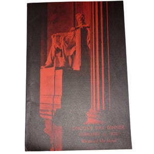 May include: A vintage event program with a red and black color scheme. The cover features a red illustration of the Lincoln Memorial and the text "LINCOLN DAY DINNER FEBRUARY 12, 1970 Westward Ho Hotel."