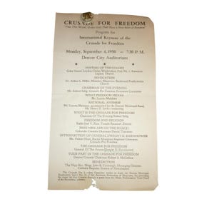 May include: A vintage program for the International Keynote of the Crusade for Freedom, dated September 4, 1950. The document features a list of speakers and events, including General Dwight D. Eisenhower. The paper is aged with some wear.