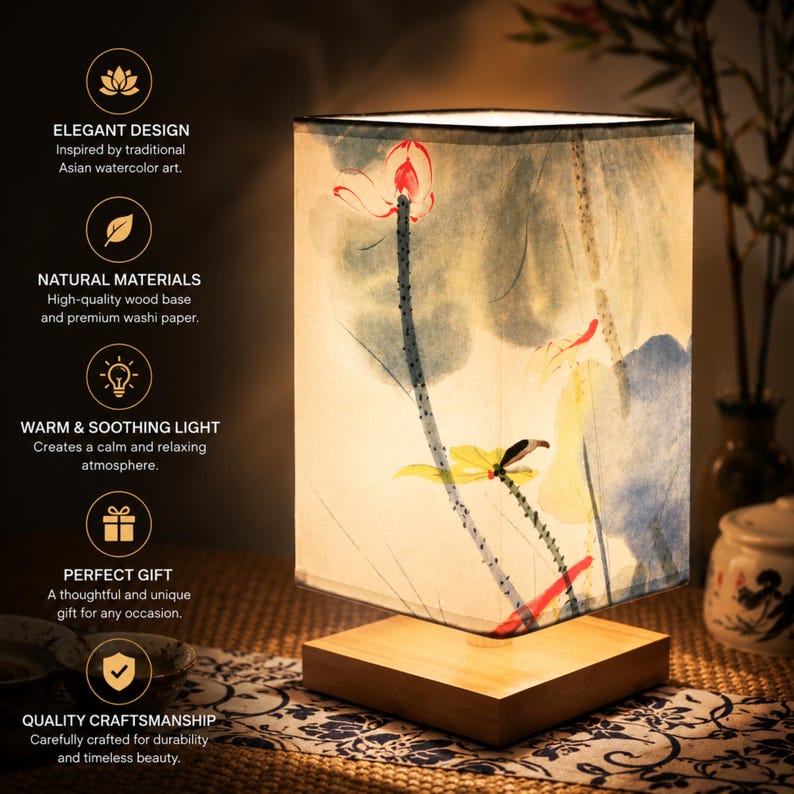 May include: A square lamp with a wooden base and a shade featuring a watercolor floral design. The lamp's shade is rectangular and displays a painting of red and yellow flowers with green stems. The text on the side says "ELEGANT DESIGN" and "NATURAL MATERIALS".