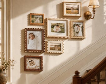 May include: A gallery wall arrangement featuring six rectangular picture frames with scalloped edges and beaded detailing. The frames vary in wood tones and cream finishes, displaying various photographs of people and baby shoes on a wall.