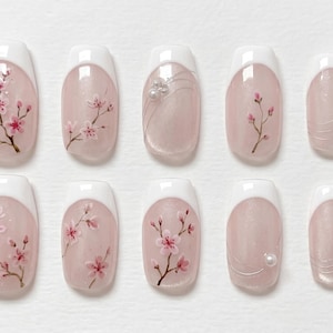 Handgjorda nagellack med franska spetsar och körsbärsblommor, återanvändbart set med vårblommor