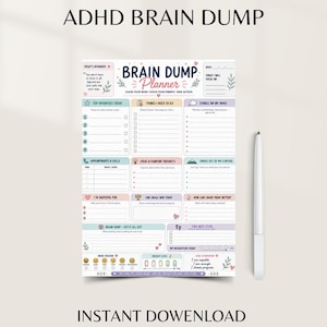 Puede incluir: Una hoja de planificador de papel blanco titulada ADHD BRAIN DUMP con secciones para prioridades, tareas, pensamientos, citas, gratitud y seguimiento del estado de &aacute;nimo. Un bol&iacute;grafo blanco est&aacute; colocado a la derecha.