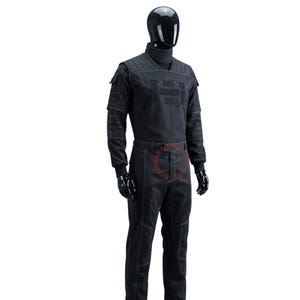 May include: A black long-sleeved tactical jumpsuit featuring a high ribbed collar, quilted shoulder panels, and white contrast stitching throughout. The garment includes structured chest detailing, utility pockets on the sleeves, and straight-leg trousers.