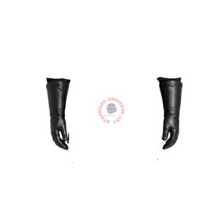 May include: A pair of black gauntlet-style gloves with long, structured cuffs extending past the wrist. The gloves feature smooth, dark surfaces and a fitted design. Between the gloves is a circular logo with the text STAR WARS UNIVERSE ART.