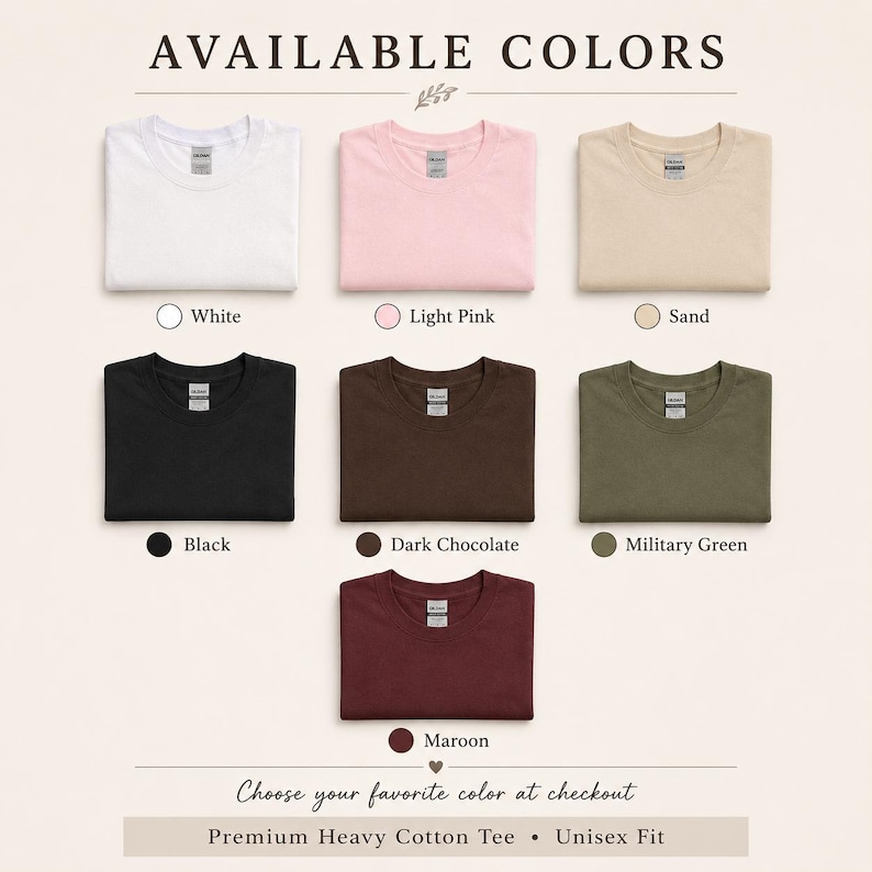 May include: A color chart for a premium heavy cotton unisex t-shirt featuring seven folded shirts in white, light pink, sand, black, dark chocolate, military green, and maroon. The text reads AVAILABLE COLORS, color names, and Choose your favorite color at checkout.