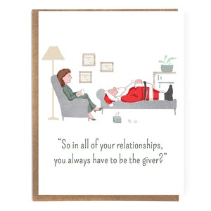 May include: A greeting card with a humorous illustration of Santa Claus on a therapist's couch. The therapist, a woman, is seated in a chair. The card includes the text: "So in all of your relationships, you always have to be the giver?"