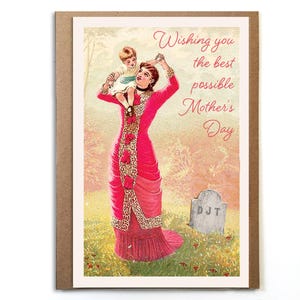 May include: Greeting card with a vintage illustration of a woman in a pink dress carrying a child on her shoulders. The card has the text "Wishing you the best possible Mother's Day" in cursive script. A tombstone is in the background.