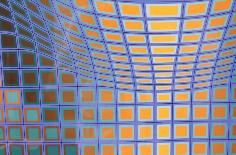 May include: Abstract pattern with a grid of squares and rectangles in shades of orange, teal, and brown against a blue background. The design has a curved, wave-like appearance, creating a sense of depth and movement. The overall aesthetic is modern and geometric.