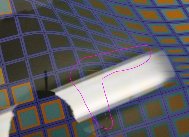 May include: Abstract image featuring a curved surface with a grid pattern in shades of blue, orange, and black. A white, curved object is in the foreground, partially obscuring the grid.
