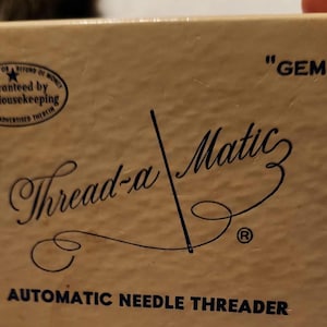 Vintage Thread-a-Matic  by Gem. Automatic needle Threader. In original box.
