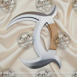 May include: A curved, silver-colored blade with a wooden handle. The blade has a unique shape, with a sharp edge and a curved design. The handle is made of light-colored wood. The item is a handmade blade.