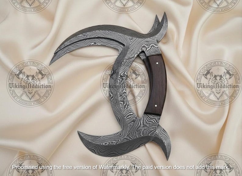 May include: A curved, Damascus steel blade with a dark wood handle. The blade has a unique, crescent shape with a textured pattern. The handle is a dark brown color. The overall design is intricate and detailed.