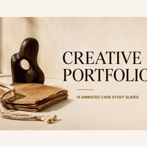 May include: A dark brown abstract wooden sculpture with a central circular cutout, a stack of tan textured paper, and a coiled beige rope. The text reads CREATIVE PORTFOLIO and 18 ANIMATED CASE STUDY SLIDES in a dark serif font on a light background.