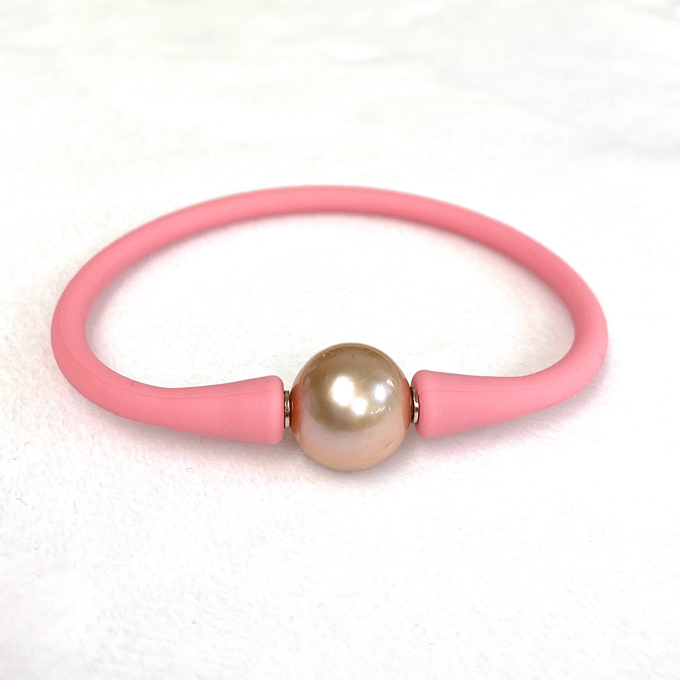 Bracelet octobre rose, bracelet oeil de chat, modèle avec inserts, perles 6  millimètres qualité aaa, logo foncé - Un grand marché