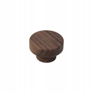 May include: A solid, round wooden cabinet knob with a dark brown finish. The knob has a cylindrical base and a flat, circular top. The wood grain is visible on the surface. This hardware is suitable for drawers and cabinets.