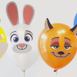 May include: Four colorful balloons with animal faces: a yellow cat, a white rabbit, an orange fox, and a blue monster. Each balloon has a unique, cartoonish design with smiling faces and large eyes. The balloons are on white sticks.