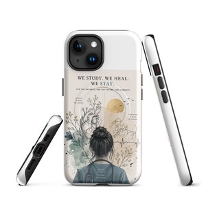 May include: A white iPhone case with a design featuring a medical theme. The case displays the text "WE STUDY. WE HEAL. WE STAY." along with illustrations of a heart, medical symbols, and a person from the back.
