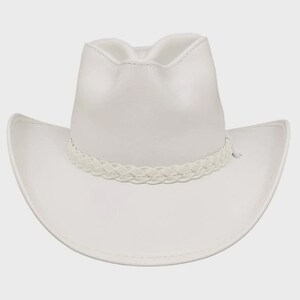May include: A solid white cowboy hat featuring a pinched crown and a wide, curved brim. The base of the crown is encircled by a decorative braided band in a matching white tone, adding texture to the smooth, clean surface of the hat design.
