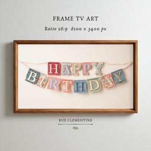 May include: A rectangular wooden frame containing digital art of a fabric banner that spells out HAPPY BIRTHDAY. The banner consists of individual square fabric patches in various colors and patterns, each featuring a letter in a contrasting color.