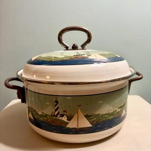 Coastal Breeze 2 Quart Metal Stew Pot featuring artwork by folk artist Warren Kimble, produced by Sakura around the years 2000–2003