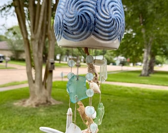 Campanilla de viento junto al mar