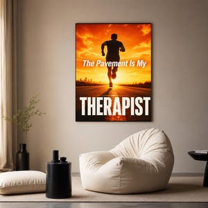 May include: A rectangular wall art print featuring a silhouette of a person running on a road at sunset. The text reads The Pavement Is My THERAPIST in white capital letters against the orange and yellow sky and dark asphalt background.