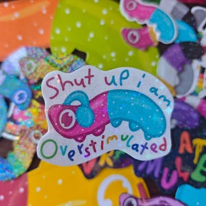 Overstimulated Gummy Worm Sticker with Headphones – Silly Glitter Art
