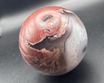 Volcano Red Agate 2.45” sphere with green UV reaction.