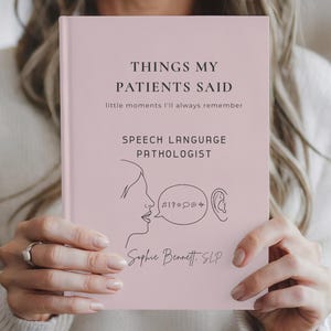 May include: A light pink book titled Things My Patients Said, little moments I'll always remember, Speech Language Pathologist, with a line art illustration of a profile, a speech bubble containing symbols, and an ear, signed Sophie Bennett, SLP.