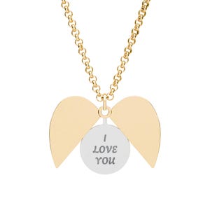 May include: A gold-colored necklace with a pendant featuring a pair of stylized wings and a circular charm. The charm has the words "I LOVE YOU" engraved in a simple font. The necklace chain is also gold-colored.