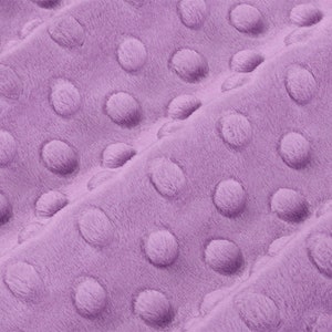 May include: Purple minky fabric with a textured dot pattern. The fabric is soft and plush.