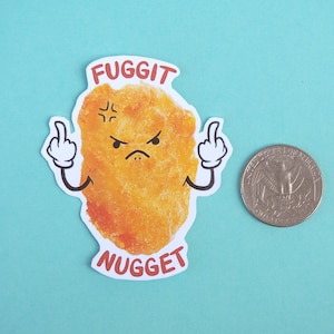 May include: A sticker of a cartoon chicken nugget with a grumpy face, giving the middle finger with both hands. The sticker says "FUGGIT NUGGET" in red letters.