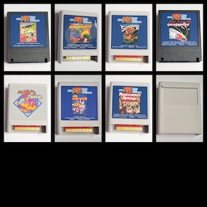 May include: Collection of Atari XEGS game cartridges. The cartridges feature colorful game art on blue backgrounds. Titles include "Star Raiders," "Star Gate," "Superman III," and "Montezuma's Revenge." The cartridges are in various colors.