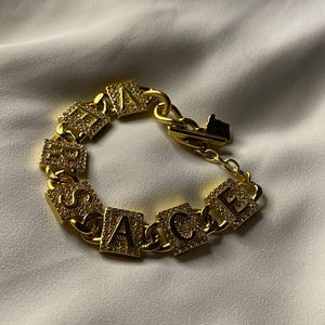 VERSACE Gold Monogram Bracelet