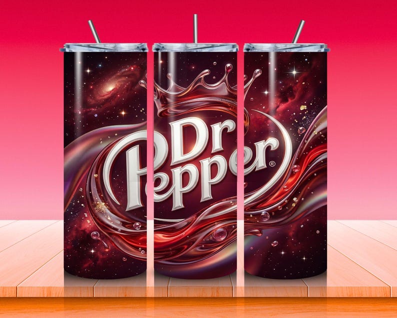 May include: Three stainless steel tumblers with a Dr Pepper design. The design features the Dr Pepper logo in white, surrounded by a swirling red and brown liquid against a cosmic background. Each tumbler has a silver lid and a straw.